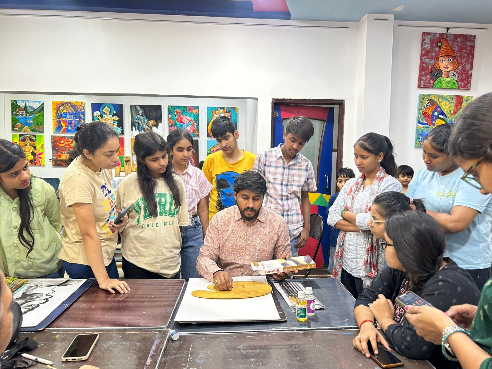 Students working on paintings